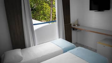 Standard Twin Room, 1 Bedroom, Private Bathroom, Sea View | Minibar, in-room safe, free WiFi, bed sheets