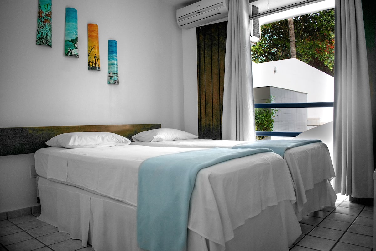 Standard Twin Room, 1 Bedroom, Private Bathroom, Sea View | Minibar, in-room safe, free WiFi, bed sheets