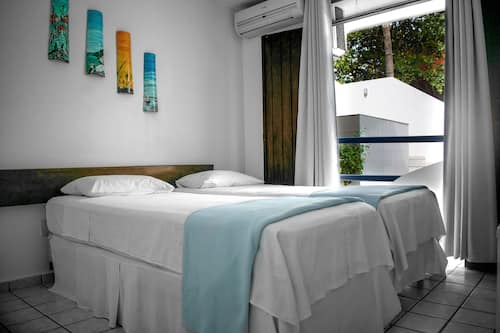 Camera Standard con 2 letti singoli, 1 camera da letto, bagno privato, vista mare | Minibar, una cassaforte in camera, Wi-Fi gratuito, lenzuola