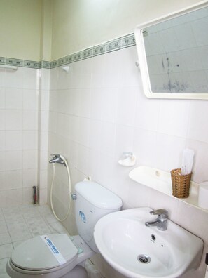 Shower, free toiletries, slippers, towels