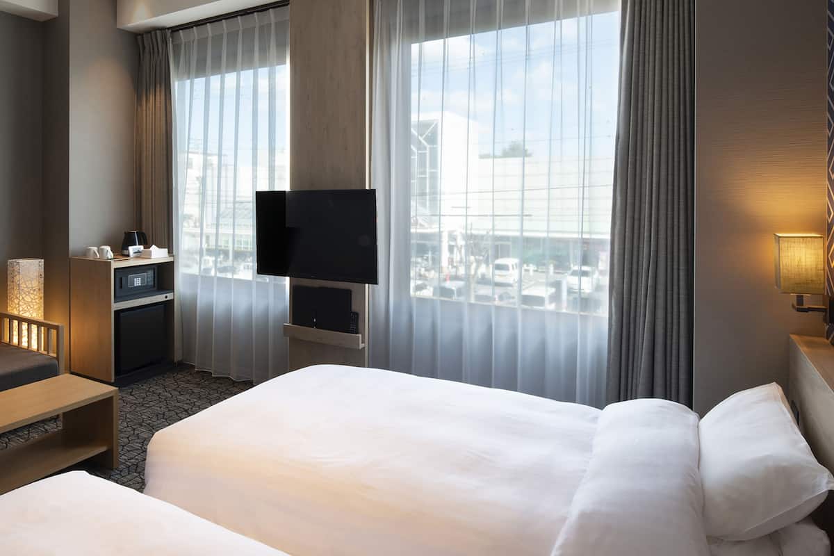 k-park twin + sofa bed with shower booth | blackout curtains, iron/ironing board, free wifi, bed sheets