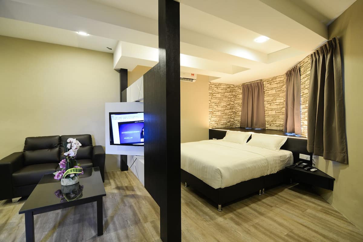 junior suite, 1 king bed | desk, blackout curtains, iron/ironing board, rollaway beds