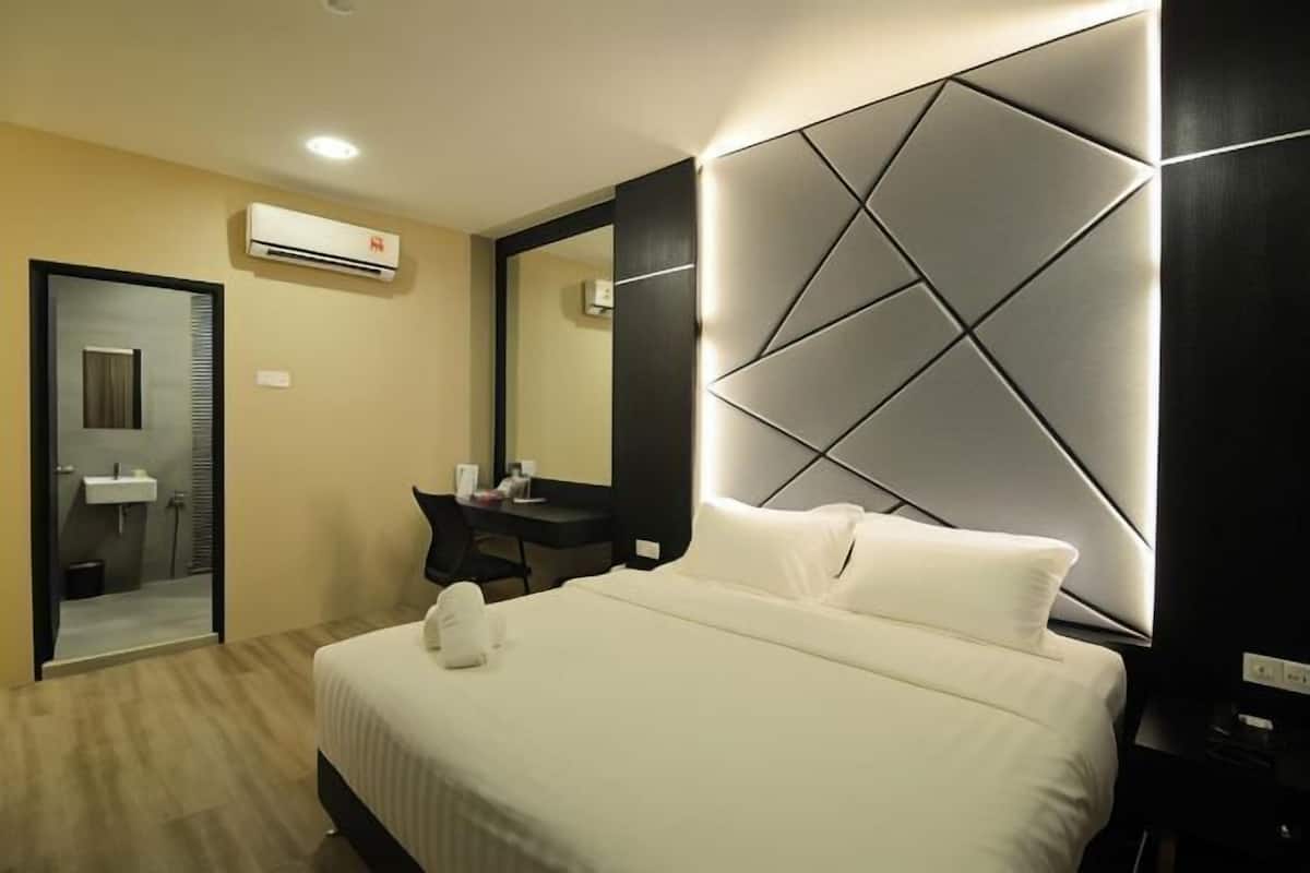 Desk, blackout curtains, iron/ironing board, rollaway beds
