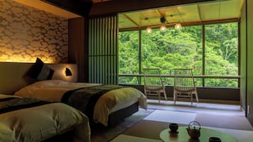 Deluxe Room | 1 bedroom, in-room safe, desk, free WiFi