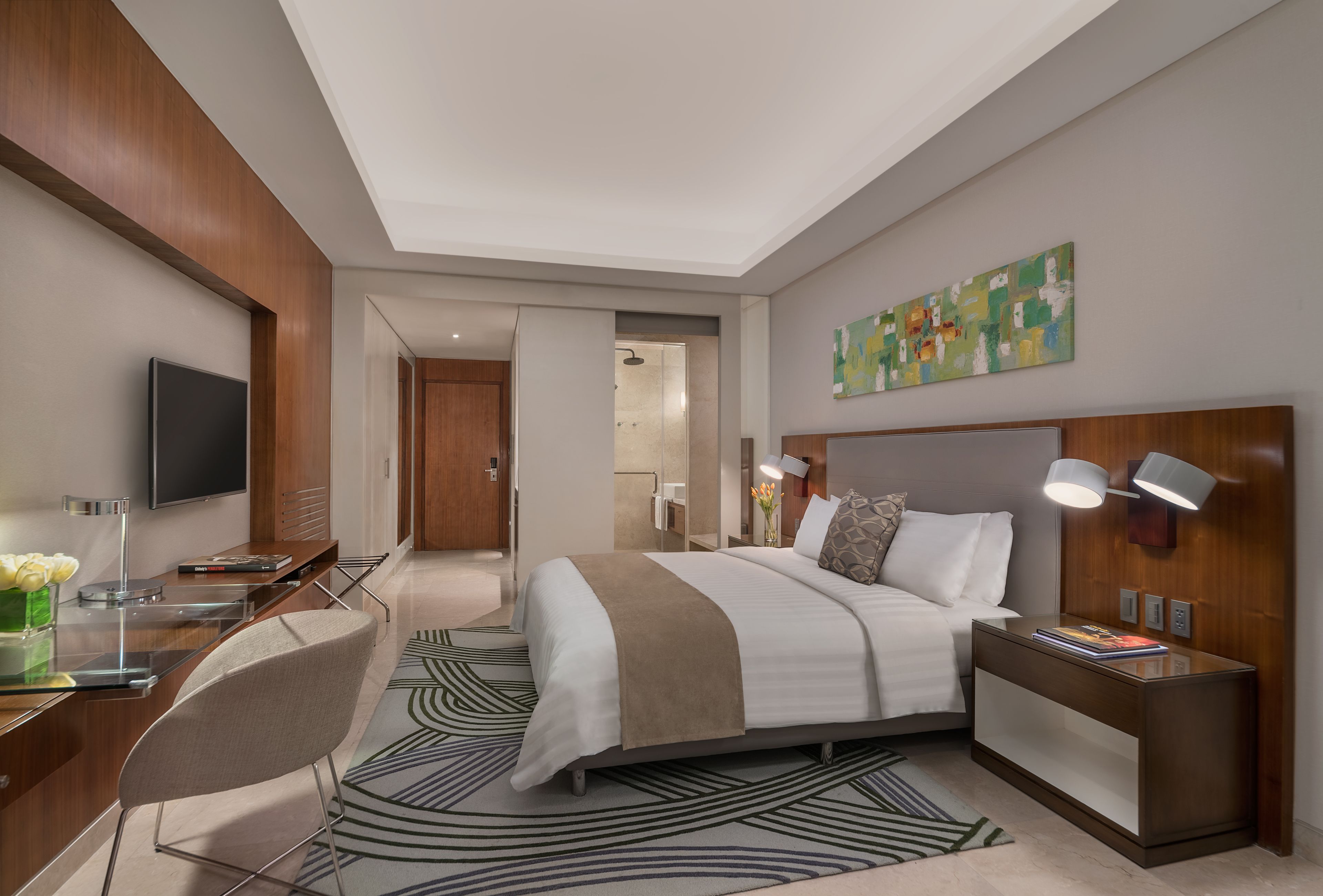 deluxe room | living area | 40-inch led tv with cable channels, tv