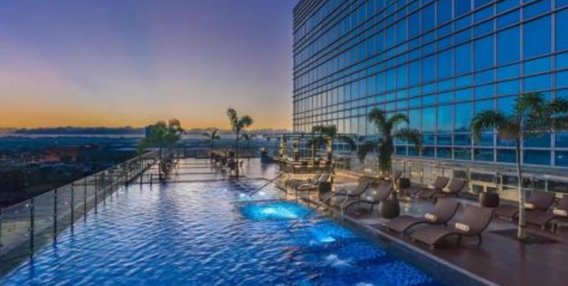 outdoor pool, open 8:00 am to 8:00 pm, pool loungers