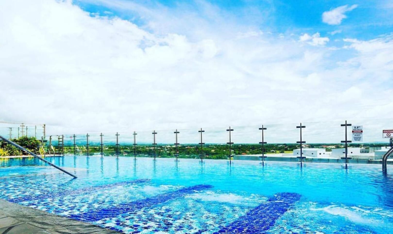 outdoor pool, open 8:00 am to 8:00 pm, pool loungers