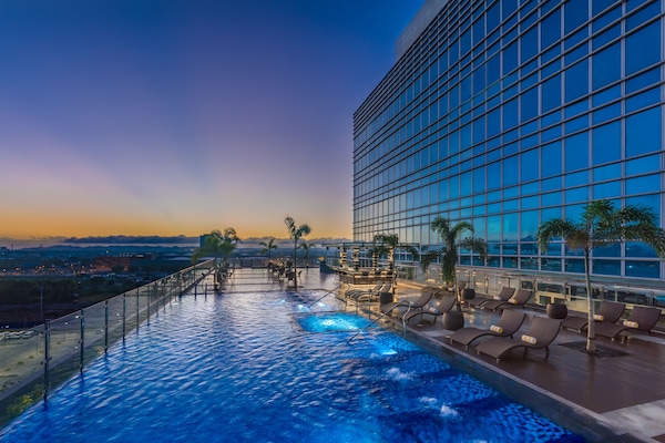 Outdoor pool, open 8:00 AM to 8:00 PM, sun loungers