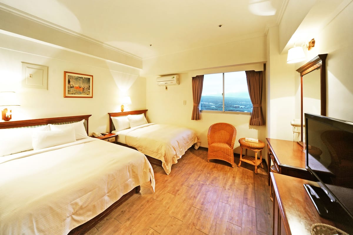 Family Quadruple Room | Desk, iron/ironing board (on request), cribs (free), WiFi (free)