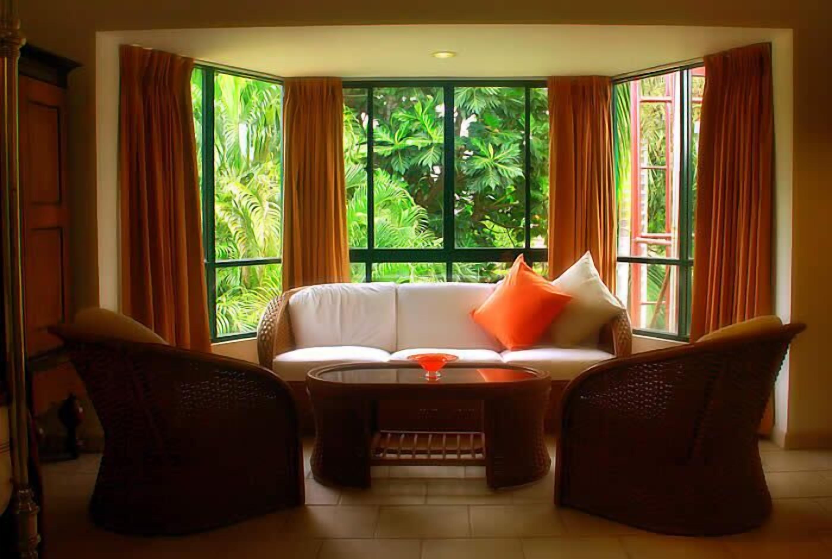 luxury studio, 1 double bed, garden view | living area | flat-screen tv