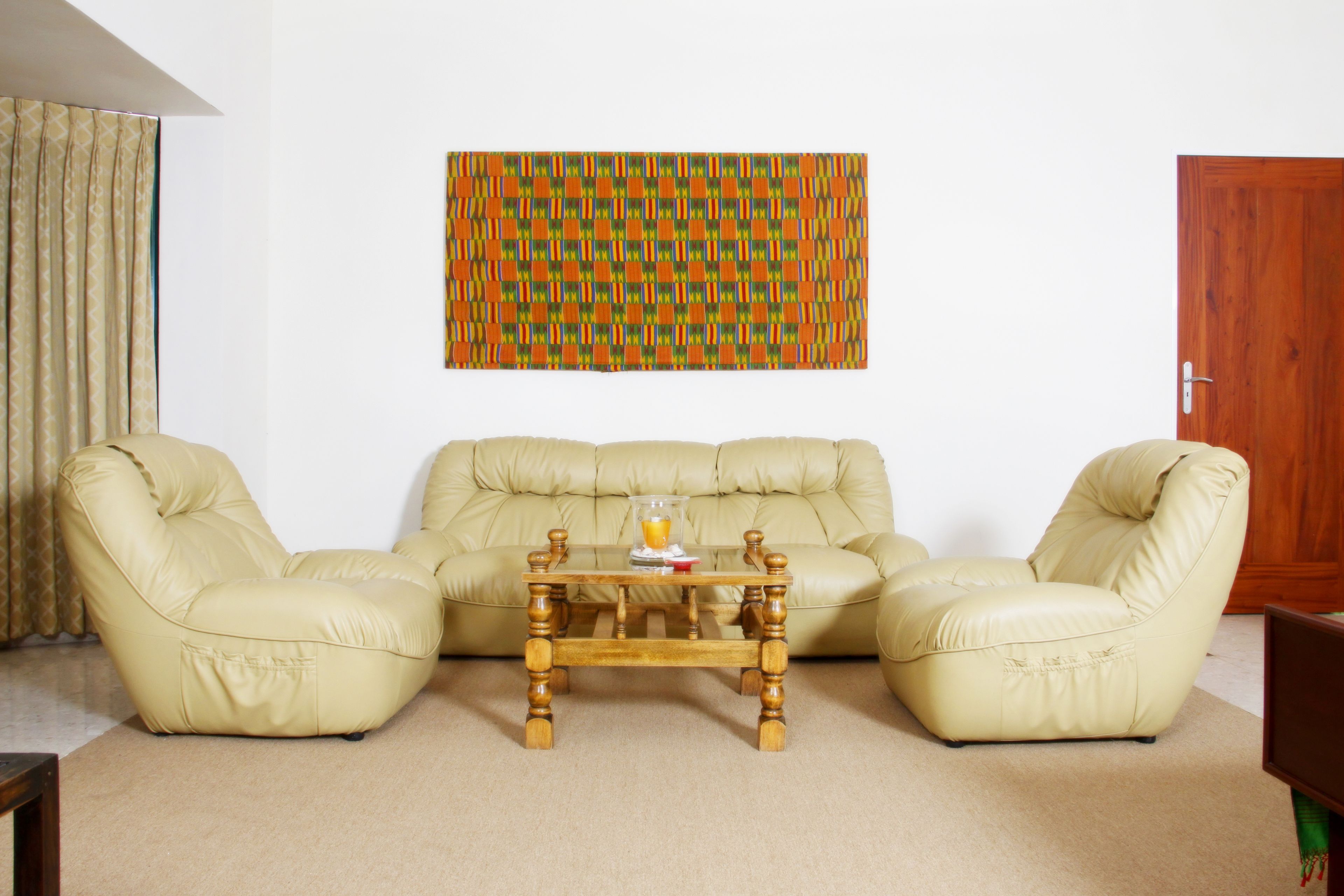 deluxe double room, 1 king bed | living area | flat-screen tv