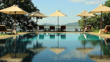 Indoor pool, outdoor pool, open 8 AM to 9 PM, pool loungers