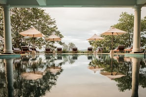 Indoor pool, outdoor pool, open 8 AM to 9 PM, pool loungers