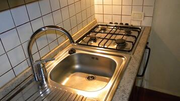 Apartment, 2 Bedrooms | Private kitchenette | Fridge, coffee/tea maker