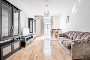 Elite Apartment, 1 Bedroom | Living room | 42-inch LCD TV with cable channels, TV, first-run movies - SutkiMinsk Apartment (Minsk)