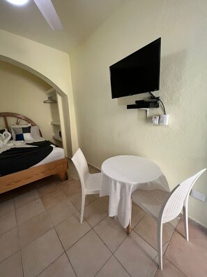 Standard Studio, 1 Bedroom, Pool Access | Living area | Flat-screen TV