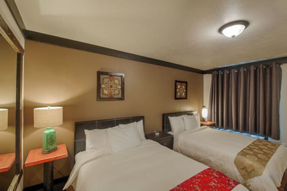 Premium bedding, memory-foam beds, iron/ironing board (on request)