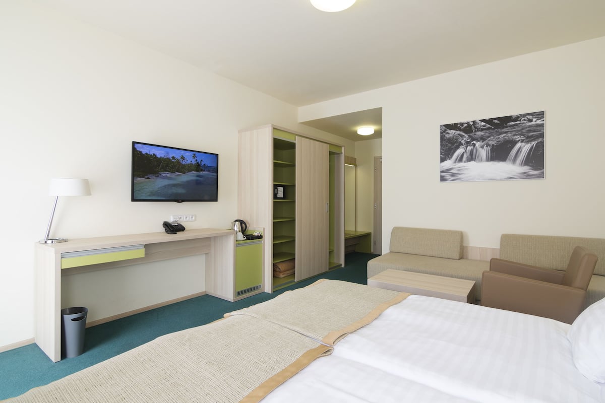 Premium bedding, memory foam beds, minibar, in-room safe