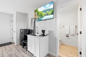 Deluxe Double Room | Desk, laptop workspace, blackout drapes, free WiFi