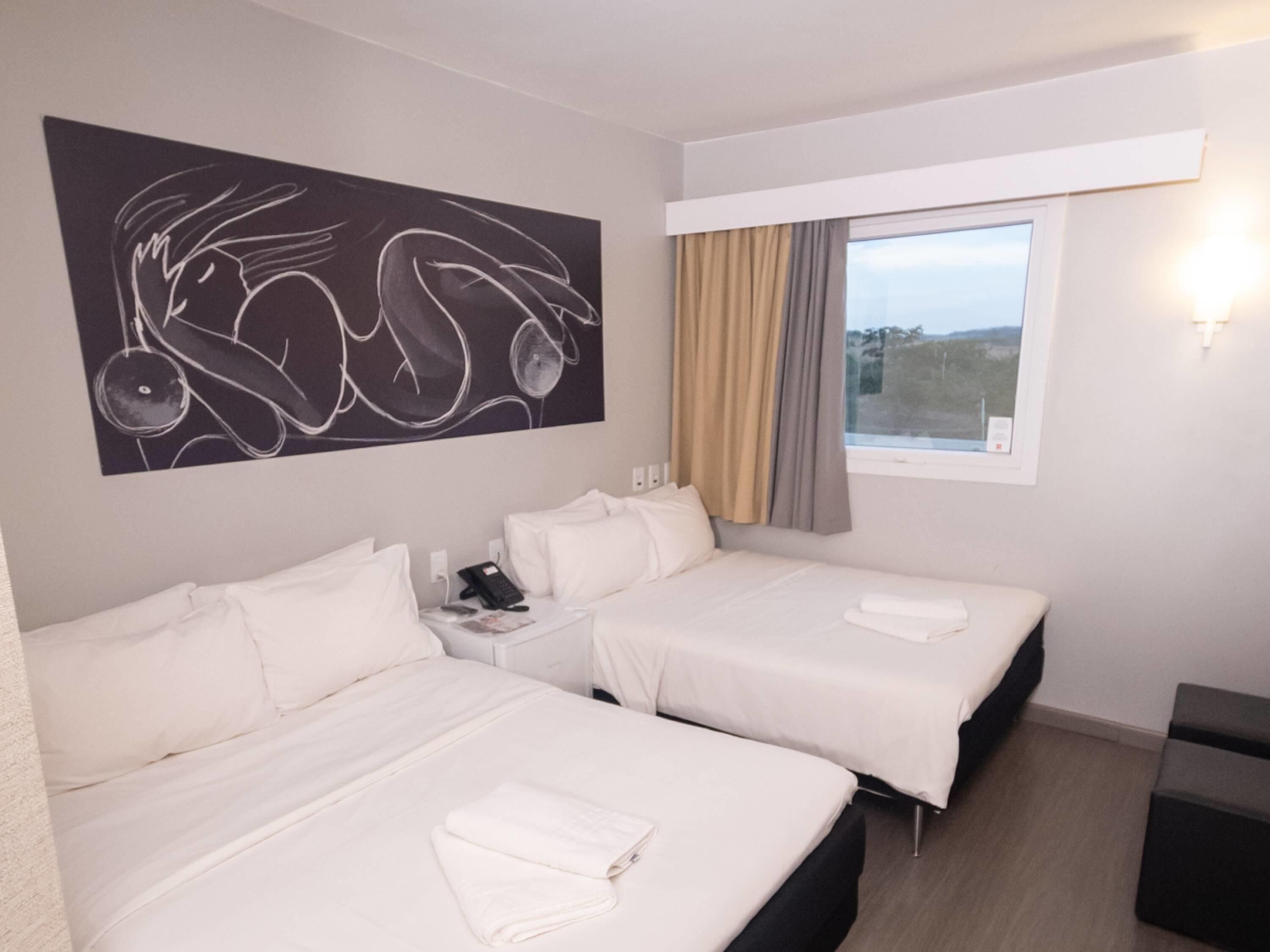 hypo-allergenic bedding, pillow-top beds, minibar, in-room safe