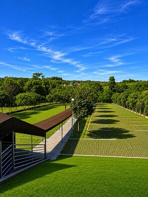 A sports field with a covered seating area and a clear sky. - ibis Catanduva (Catanduva)
