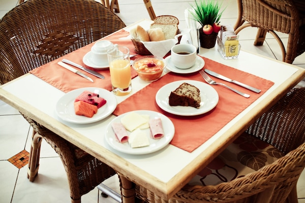 Daily buffet breakfast (BRL 28 per person)