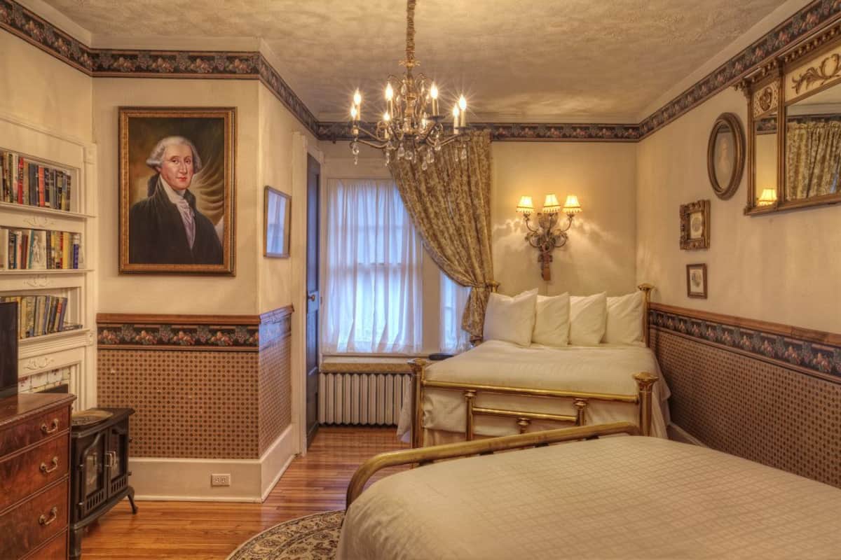 Deluxe Quadruple Room | Peralatan tempat tidur premium, dihias secara berasingan