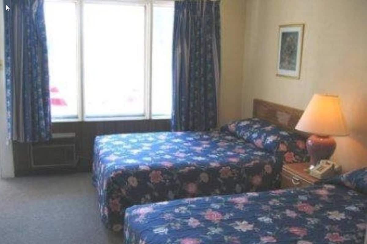 Kamar Keluarga, 2 Tempat Tidur Double, Bebas Asap Rokok | Wi-Fi gratis dan seprai linen