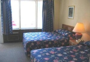 Kamar Keluarga, 2 Tempat Tidur Double, Bebas Asap Rokok | Wi-Fi gratis dan seprai linen