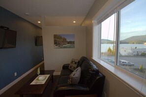 43-inch flat-screen TV with cable channels, TV, pay films