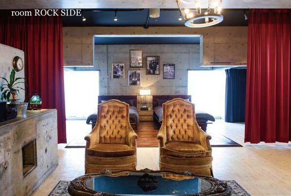 Deluxe Apartment (Rock Side) | Living room | 30-inch flat-screen TV with satellite channels, TV, DVD player - Trip Shot Hotels Koza (Okinawa)