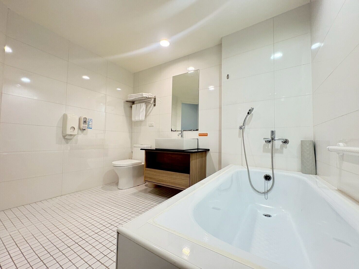 deluxe triple room | bathroom | free toiletries, hair dryer, slippers, towels