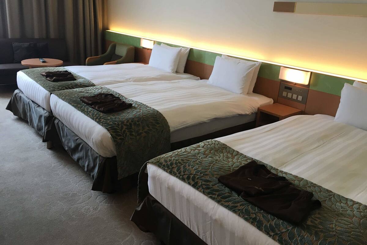 Kamar Triple Deluks, Bebas Asap Rokok | Brankas, Wi-Fi gratis, dan seprai linen