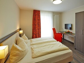 Desk, iron/ironing board, free cots/infant beds, rollaway beds