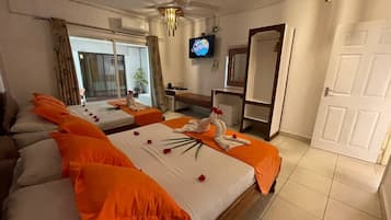 Standard Quadruple Room, 2 Queen Beds | 1 bedroom, minibar, in-room safe, desk