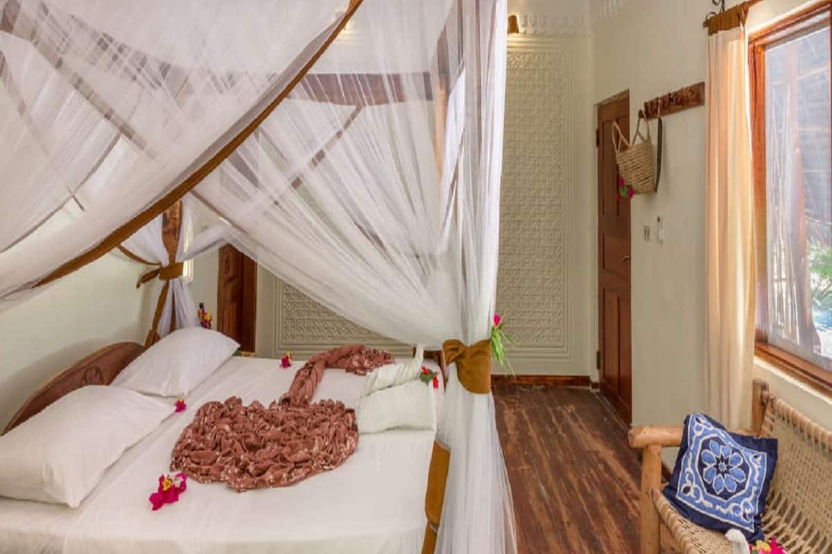 Bungalow, Ocean View | 1 bedroom, in-room safe, desk, iron/ironing board