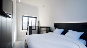 Escritorio, camas extra, wifi gratis y ropa de cama 