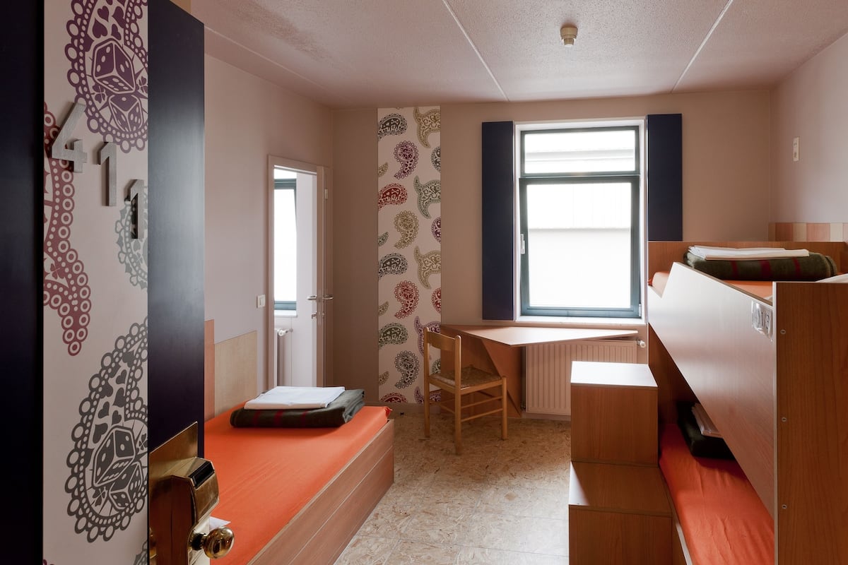 Desk, rollaway beds, free WiFi, bed sheets