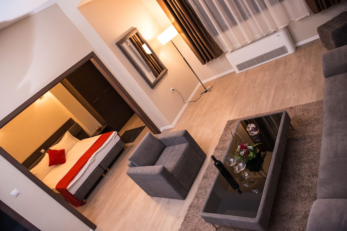 Suite, 1 Bedroom, City View | 1 bedroom, minibar, desk, iron/ironing board
