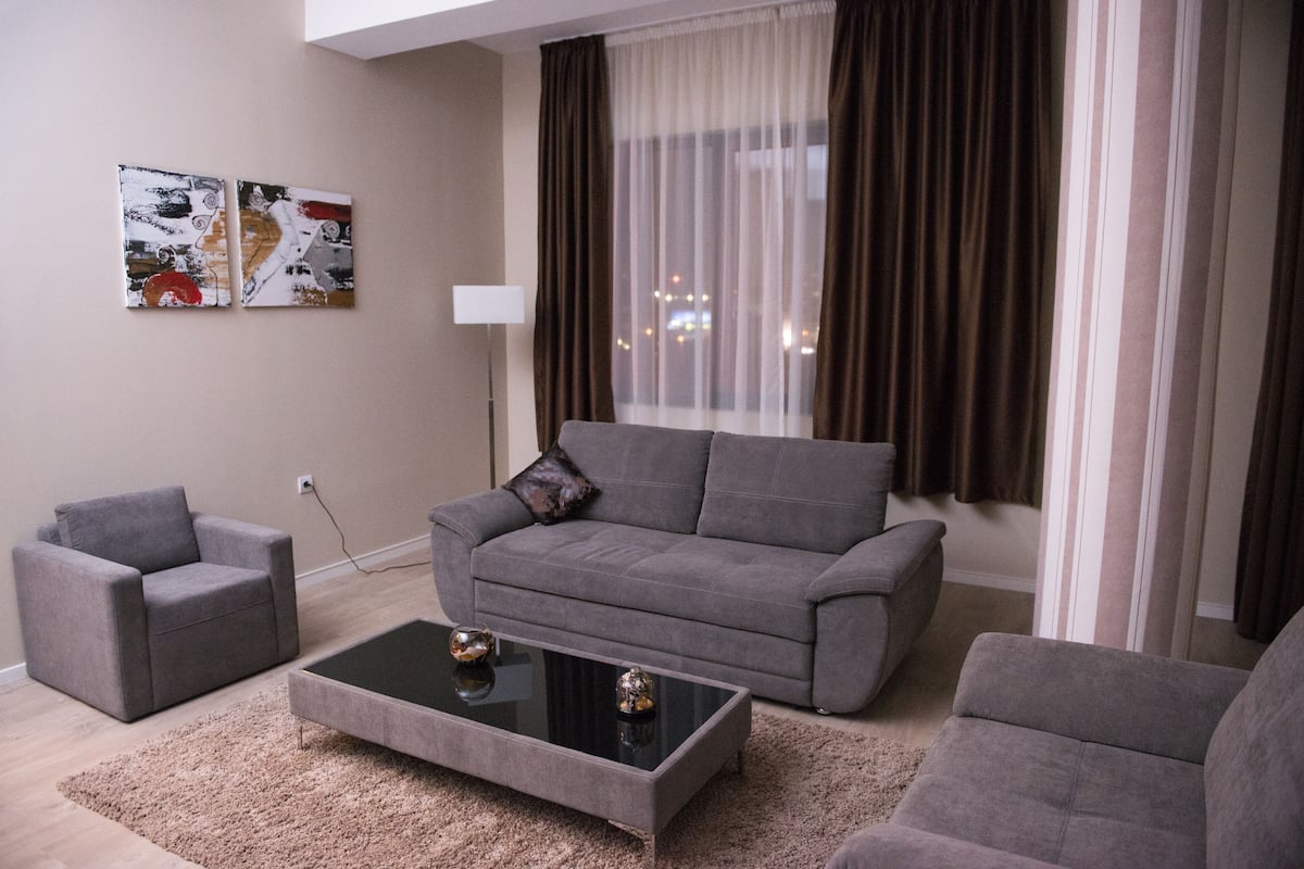 Superior Suite, 1 Bedroom | Living area | Flat-screen TV