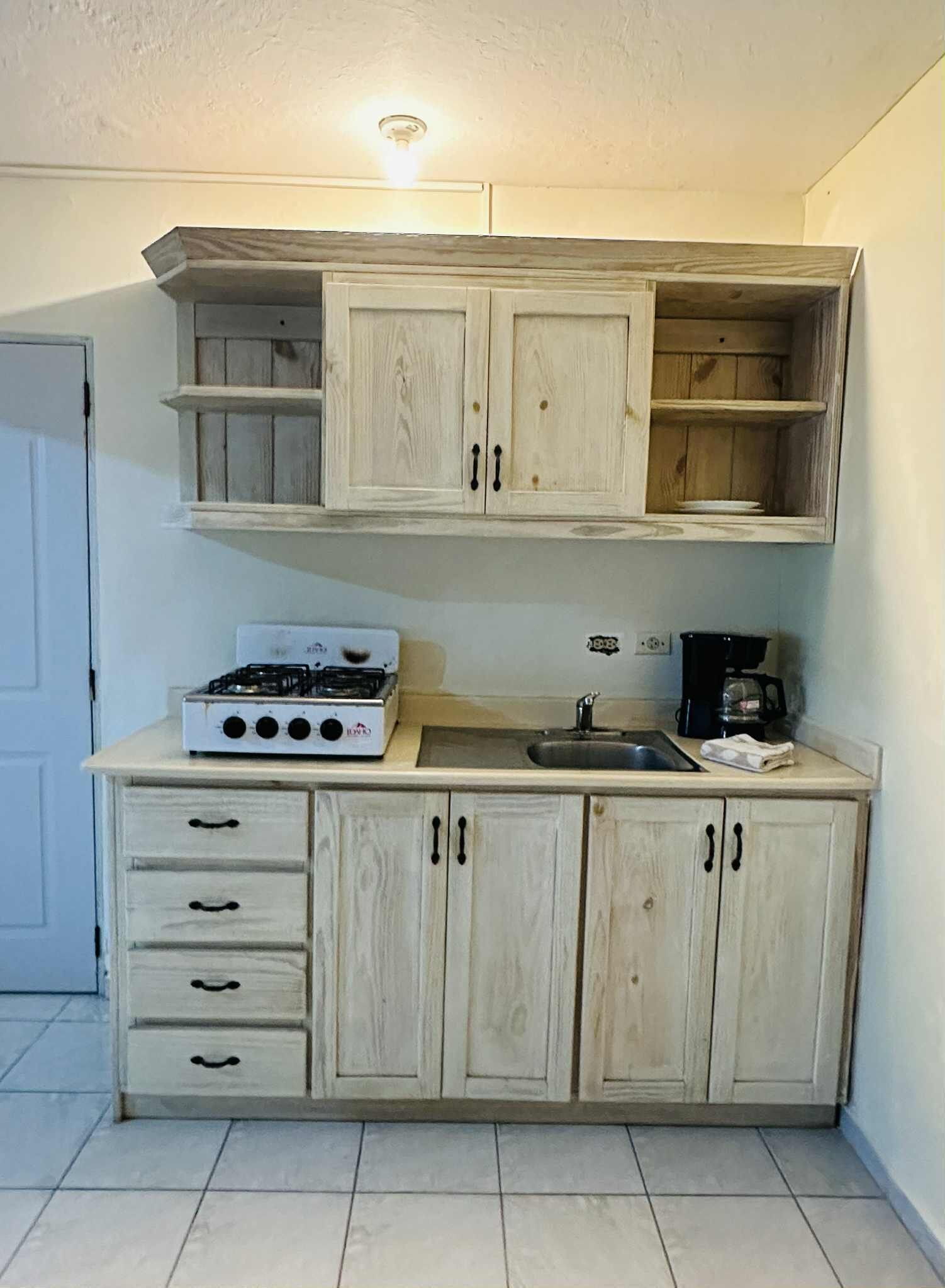 family studio suite | private kitchen | fridge, coffee/tea maker, dining tables