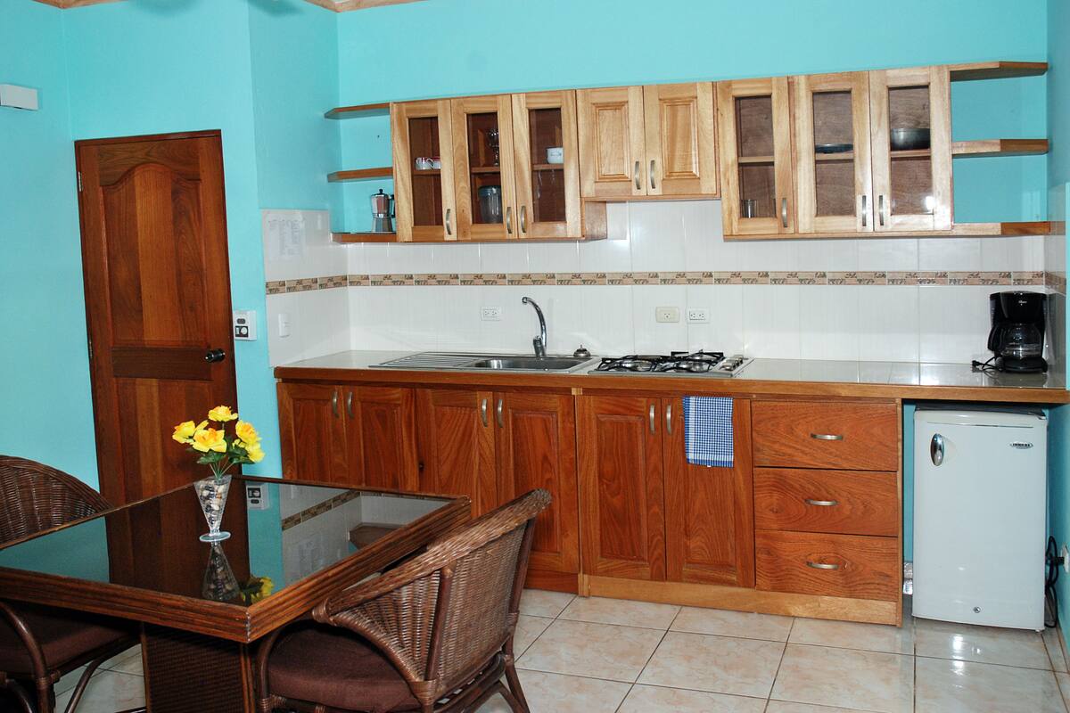 fridge, coffee/tea maker, dining tables