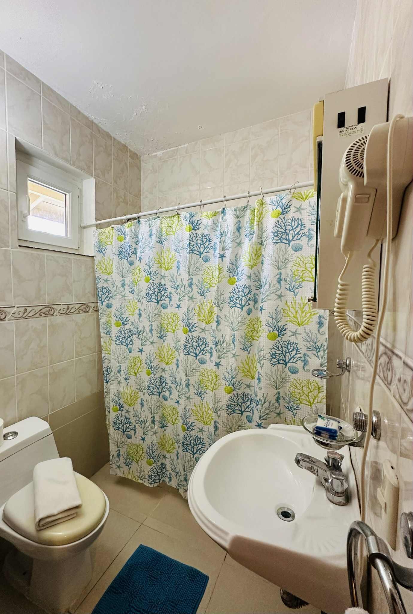 comfort apartment, 1 bedroom | bathroom | combined shower/bathtub, free toiletries, hair dryer, towels