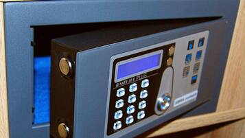 A safe with a keypad and a digital display, indicating a security feature.