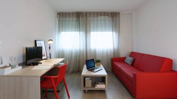 Suite Studio, accessible aux personnes à mobilité réduite | Salle de séjour