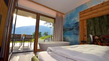 Luxury Suite, 2 Bedrooms, Whirlpool and Sauna, Mountain View | 1 bedroom, down duvets, individually decorated, individually furnished