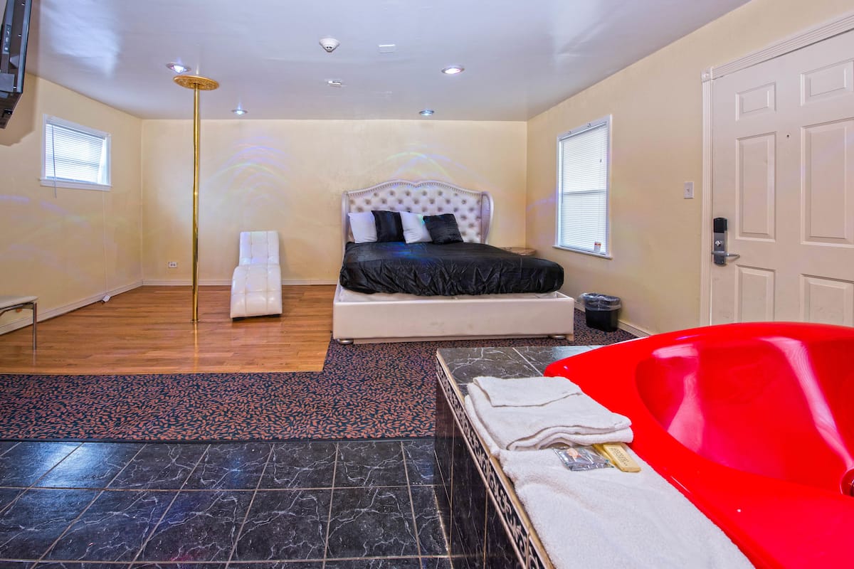 Luxe kamer, 1 kingsize bed, hot tub | Een bureau, gratis wifi