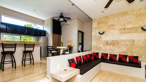 42-inch flat-screen TV with cable channels, TV, fireplace - Condo Hotel El Vivero Tulum (Tulum)