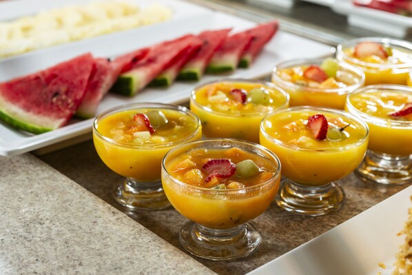 A dessert tray with fruit parfaits and watermelon slices. - Laghetto Villa Moura (Rio Grande)
