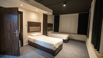 Deluxe-Einzelzimmer | Minibar, Zimmersafe, individuell dekoriert, individuell eingerichtet